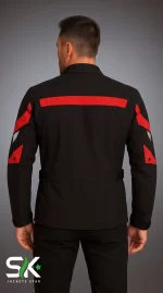Studio back view of our freshly produced black textile motorcycle jacket featuring a red horizontal back stripe, red arm paneling, and an adjustable waist belt.