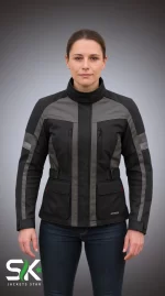 Front view of a female model wearing our manufactured grey and black textile motorcycle riding jacket with chest ventilation zippers, waist adjusters, and lower flap pockets.