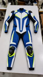 Flat lay front view of a blue, white, black, and neon yellow leather motorcycle racing suit with armor sliders.