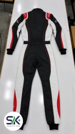 Flat lay rear view of black white and red high-abrasion Cordura go-kart racing suit manufactured on demand in Sialkot.