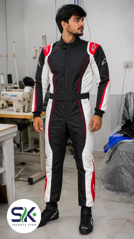 Male model standing in factory wearing black white and red Cordura go-kart racing suit made on demand in Sialkot.