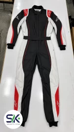 Black white and red high-abrasion Cordura go-kart racing suit flat lay manufactured on demand in Sialkot.