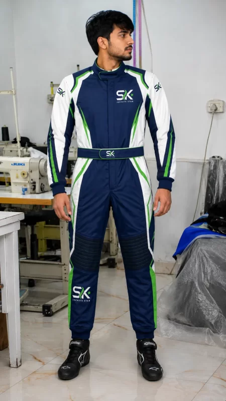 Male model standing in factory wearing navy blue white and green custom go-kart racing suit with chest logo made on demand in Sialkot.